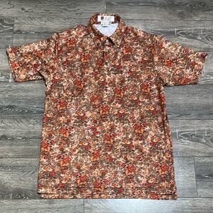 Men’s brown floral iliac golf shirt size medium.